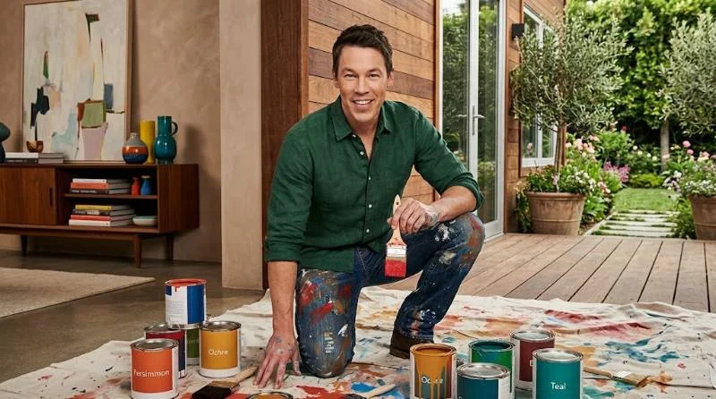 David Bromstad painting a mural during a Color Splash style room makeover