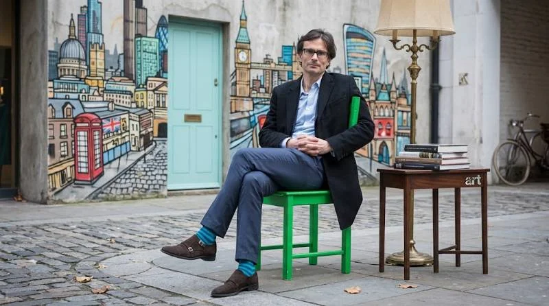 Robert Peston walking through Westminster on a working morning