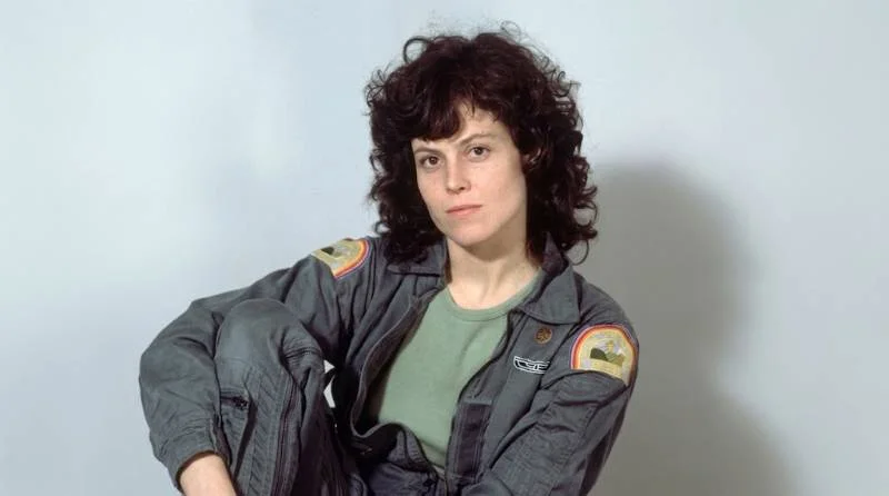 Sigourney Weaver in a 1970s-style sci-fi corridor scene